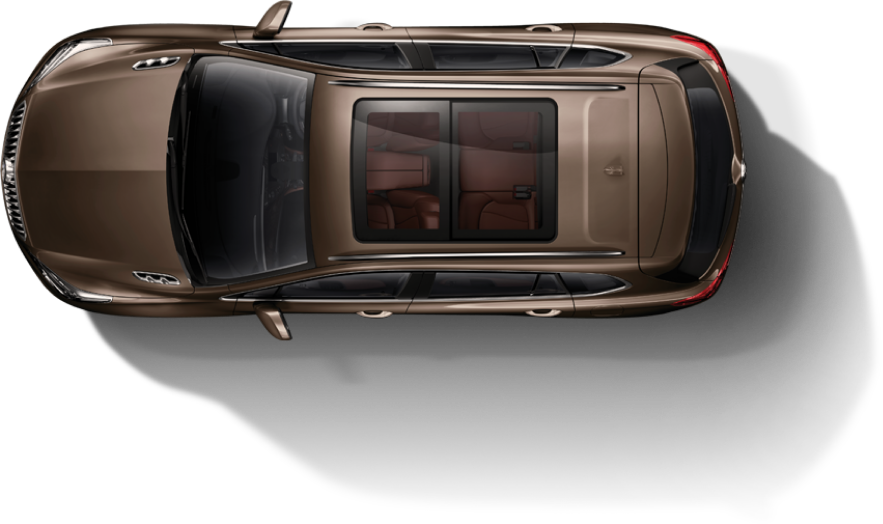 Top view of a sleek car with a panoramic sunroof and brown leather interior.