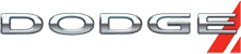 Close-up of the Dodge logo in silver letters on a black background.